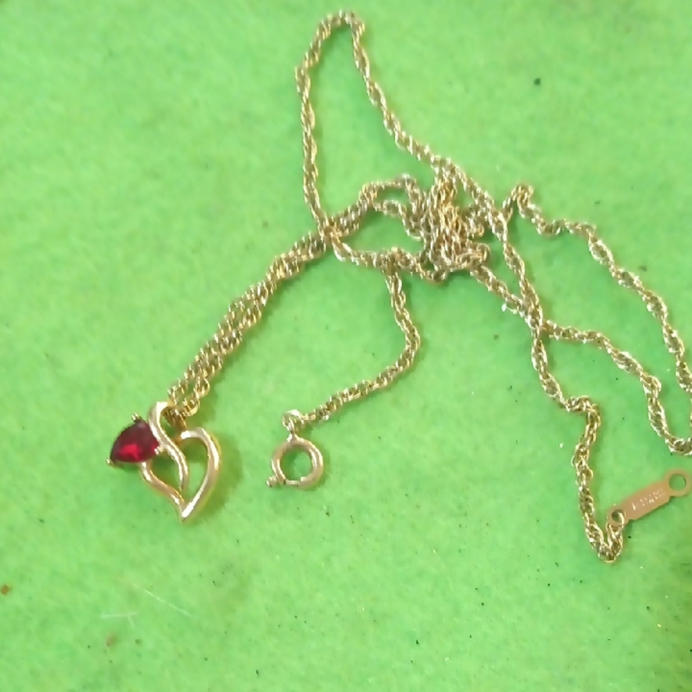 Elegant Gold Necklace with Red Heart Accent